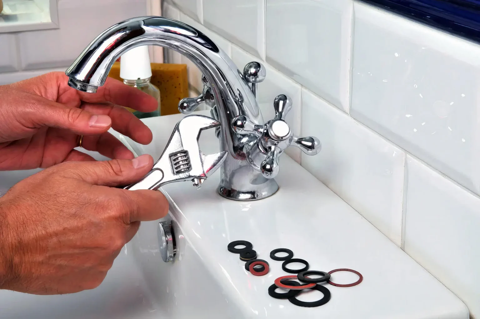 Plumber maintaining a bathroom faucet in Irvine